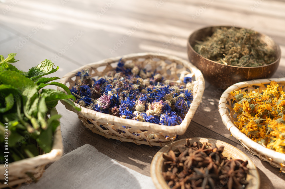 Bowls with dried flowers. Preparation for the practice of creating a mandala from flowers. Bowls with dried flowers. Preparation for the practice of creating a mandala from flowers.