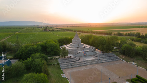 Aerial view of The Mausoleum of  Heroes of World War I from Marasesti, Romania. Photography was taken from a drone at a higher altitude at sunset with the building in the view.