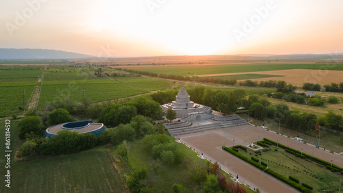 Aerial view of The Mausoleum of  Heroes of World War I from Marasesti, Romania. Photography was taken from a drone at a higher altitude at sunset with the building in the view.