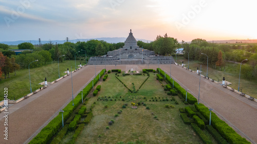 Aerial view of The Mausoleum of  Heroes of World War I from Marasesti, Romania. Photography was taken from a drone at a higher altitude at sunset with the building in the view.