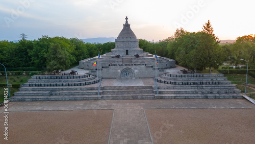 Aerial view of The Mausoleum of  Heroes of World War I from Marasesti, Romania. Photography was taken from a drone at a higher altitude at sunset with the building in the view.