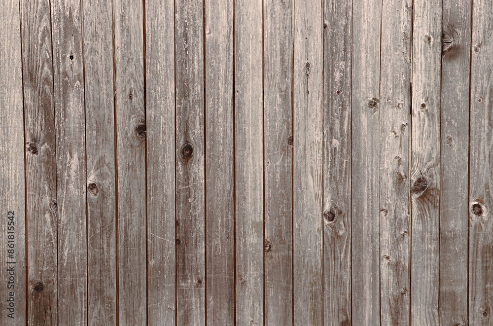 Background, texture of wooden boards weathered and faded in the sun Background, texture of wooden boards weathered and faded in the sun