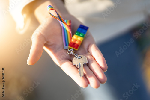 Canvastavla Lgbt flag keychain with the key for hotel guesthouse, hostel door on person's ha