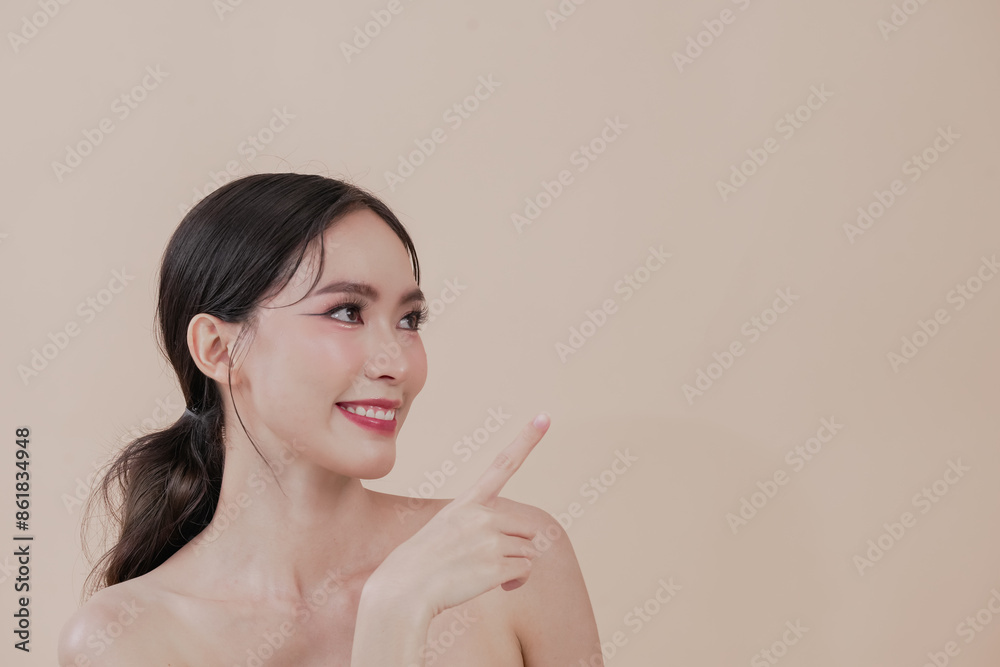 young asian woman with clean fresh skin on beige background, Cosmetics, Face care, Facial treatment, Cosmetology, beauty and spa, Asian women portrait. woman with make up brush cosmetic Beautiful young asian woman with clean fresh skin on beige background, Cosmetics, Face care, Facial treatment, Cosmetology, beauty and spa, Asian women portrait. woman with make up brush cosmetic Beautiful