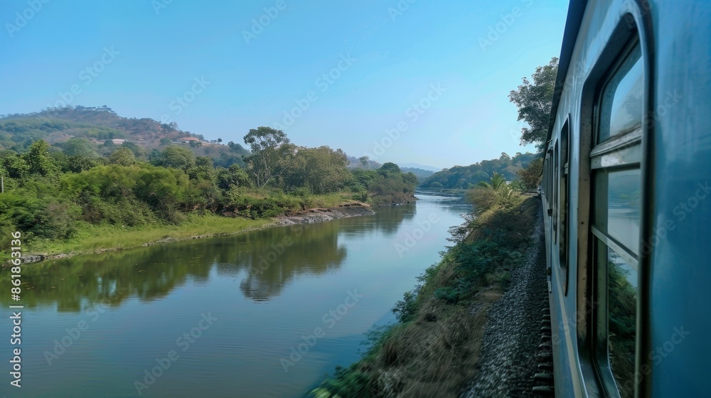 Fototapeta premium A peaceful journey alongside a serene river away from the hustle and bustle of the city.