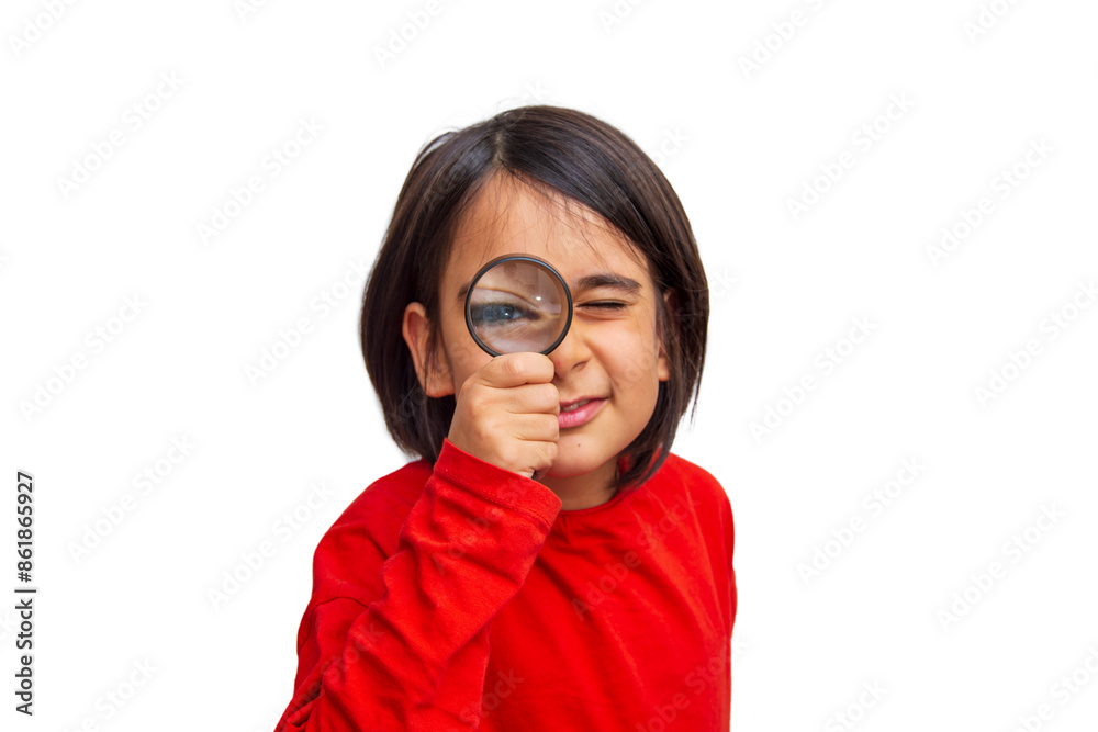 Little girl in red t-shirt looks towards camera with magnifying glass on white isolated background Little girl in red t-shirt looks towards camera with magnifying glass on white isolated background