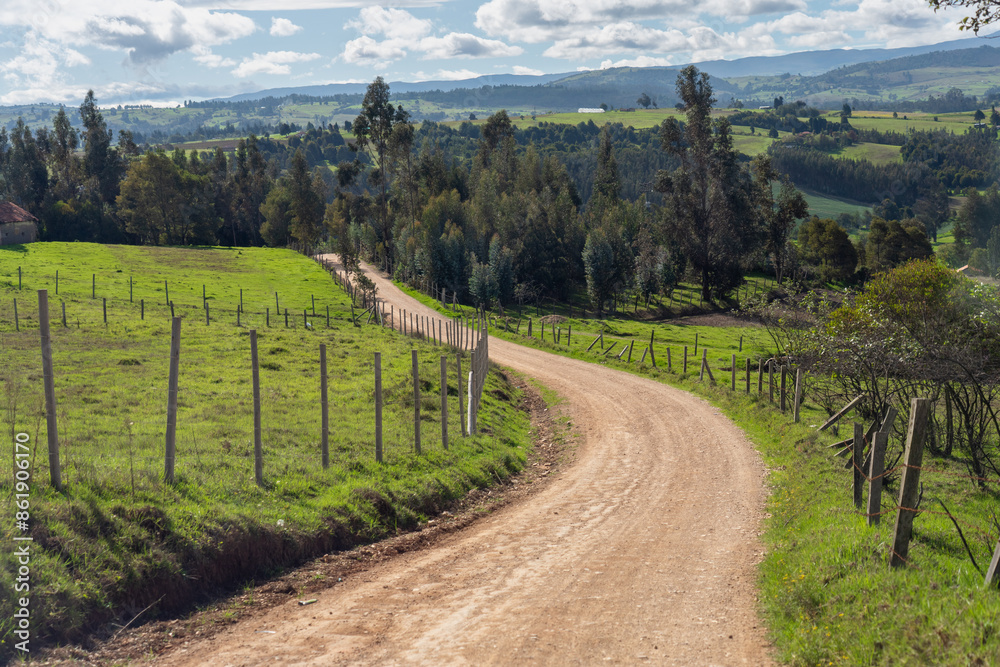 Colombian rural road with trees and mountains. Colombian rural road with trees and mountains.