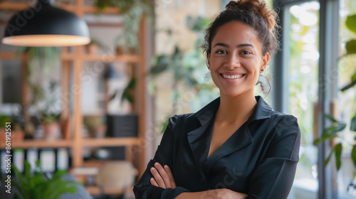 Close-up photo A beautiful, professional business woman uses a notebook with a smile. 