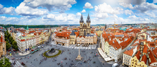 Obraz na płótnie Panoramic view over the old town of Prague, Czech Republic, with Tyn Church and crowded old town square during a sunny summer day w salonie