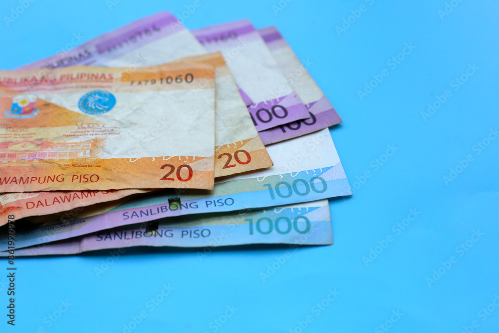 Philippine money, Banknotes on blue background. Philippine money, Banknotes on blue background.