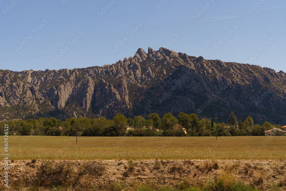 A View of the Montserrat Mountains From a Field in Spain A View of the Montserrat Mountains From a Field in Spain