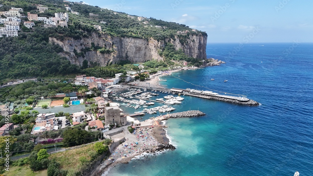 Fototapeta premium Located on the slopes of Mount Sant'Angelo, Vico Equense is a town on the Sorrento peninsula that offers breathtaking landscapes, beautiful beaches and a charming historic center of medieval origins