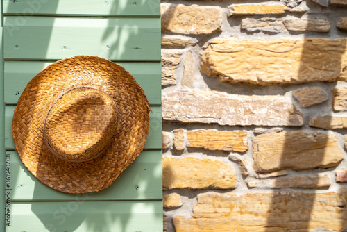 Summer hat on the rustic brick wall