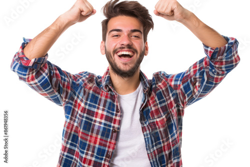 Excited young man celebrating success. Happy young man with raised arms celebrating victory. Isolated on white background.