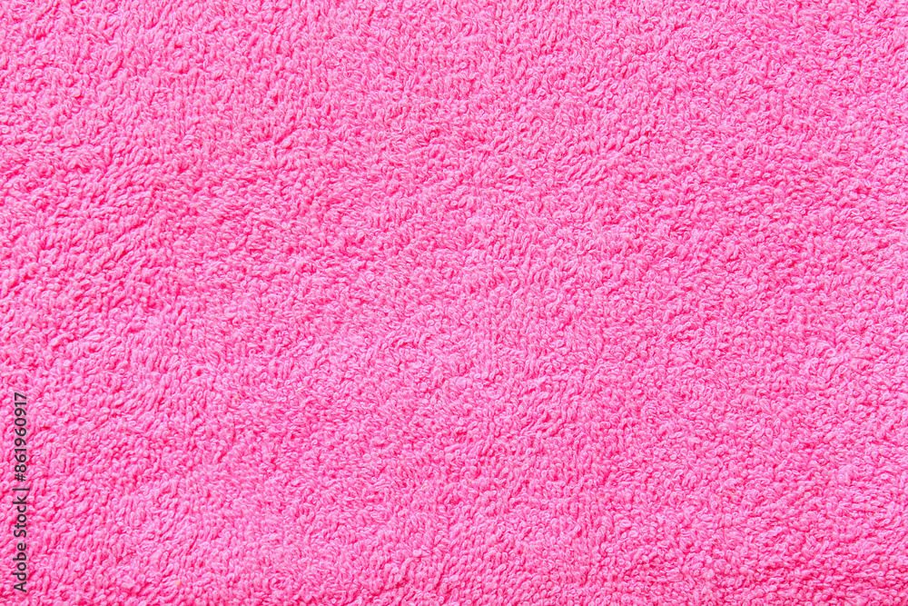 Closeup view of pink towel texture as background Closeup view of pink towel texture as background