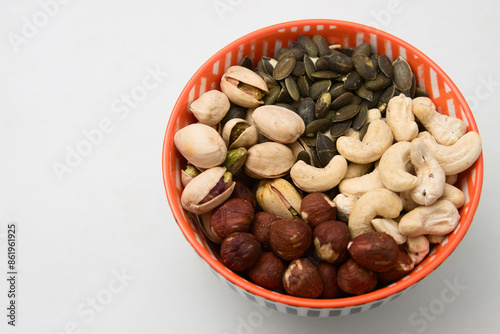 Mixture of nuts such as hazelnuts, sunflower seeds, pistachios and cashews in a bowl