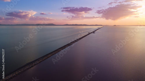 Bild auf Leinwand Sunset Aerial Views of the Great Salt Lake Lucin Cutoff Divide Pink Water Contra