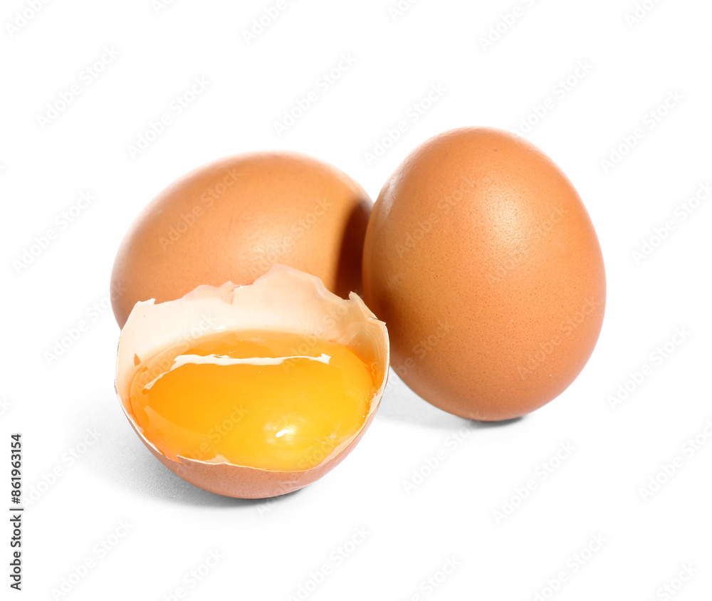 Cracked and whole chicken eggs on white background Cracked and whole chicken eggs on white background