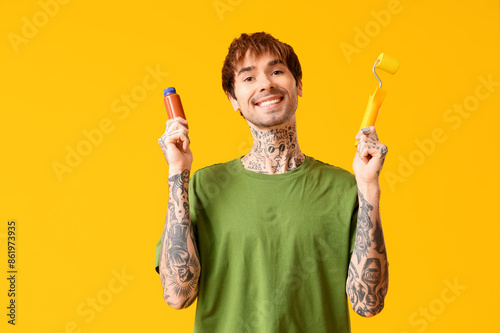 Happy young man with bottle...