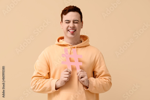 Funny young man with hashta...