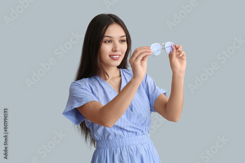 Beautiful young happy Asian...