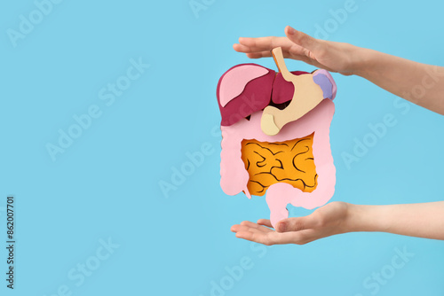 Woman with paper digestive ...