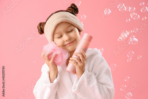 Cute little girl in bathrob...