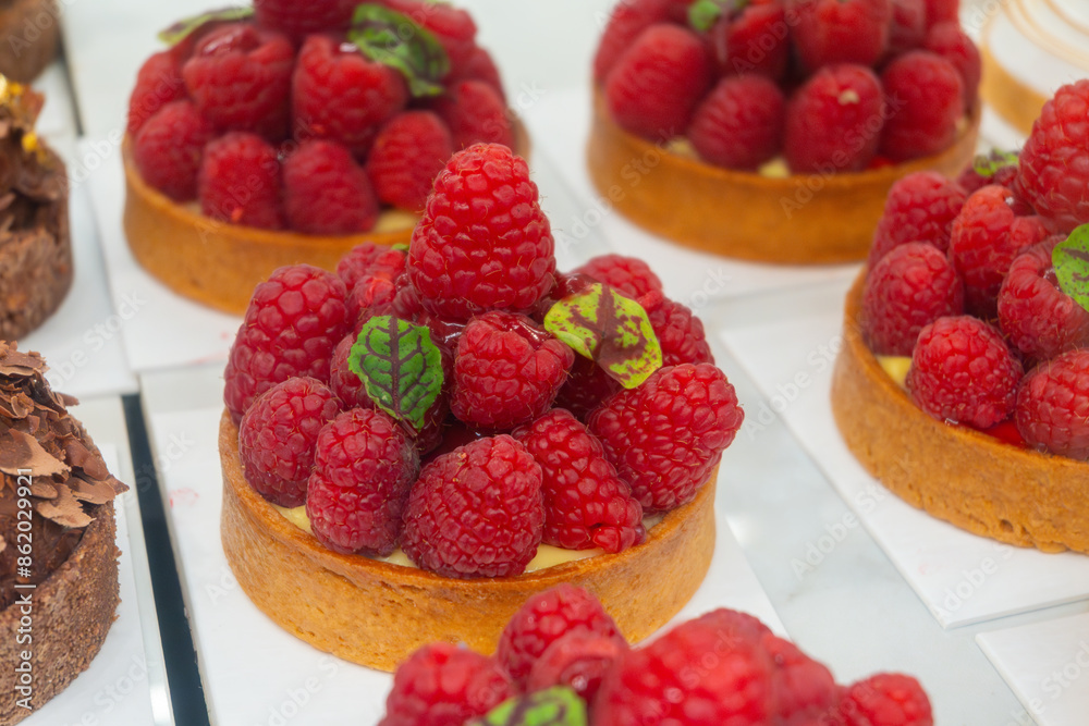 Sweet cake red fruits and berries framboise tartlets with cream Sweet cake red fruits and berries framboise tartlets with cream