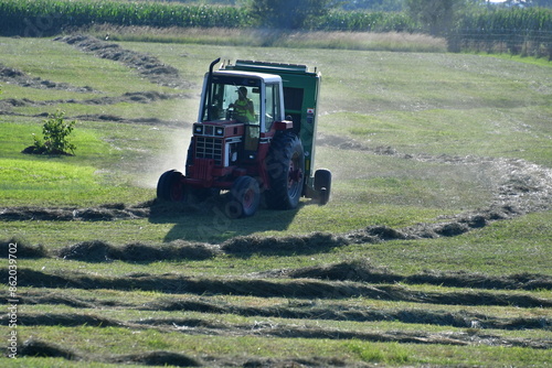 Tractor and Baler in a Hay Field