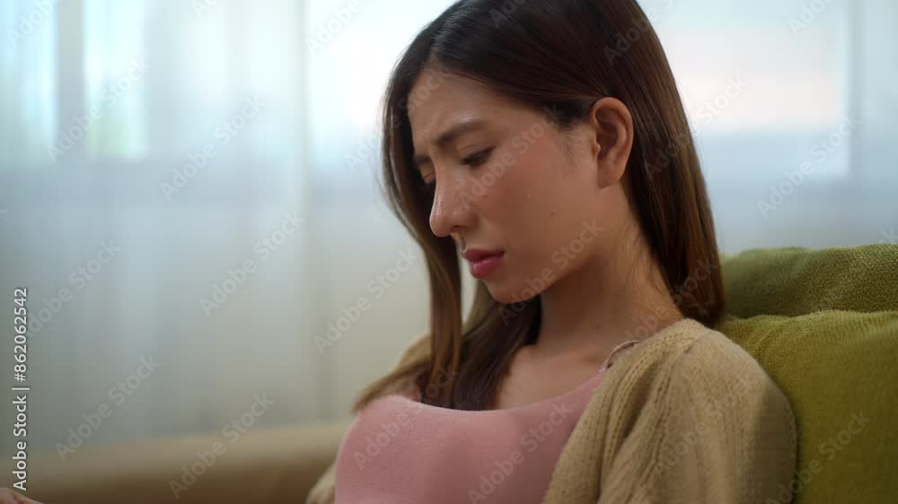 Young girl feel stress and fear while holding the positive pregnancy test, anxiety pregnant woman with unexpected pregnancy results, lady regret for unwanted pregnancy mistake crisis at home.
Young girl feel stress and fear while holding the positive pregnancy test, anxiety pregnant woman with unexpected pregnancy results, lady regret for unwanted pregnancy mistake crisis at home.