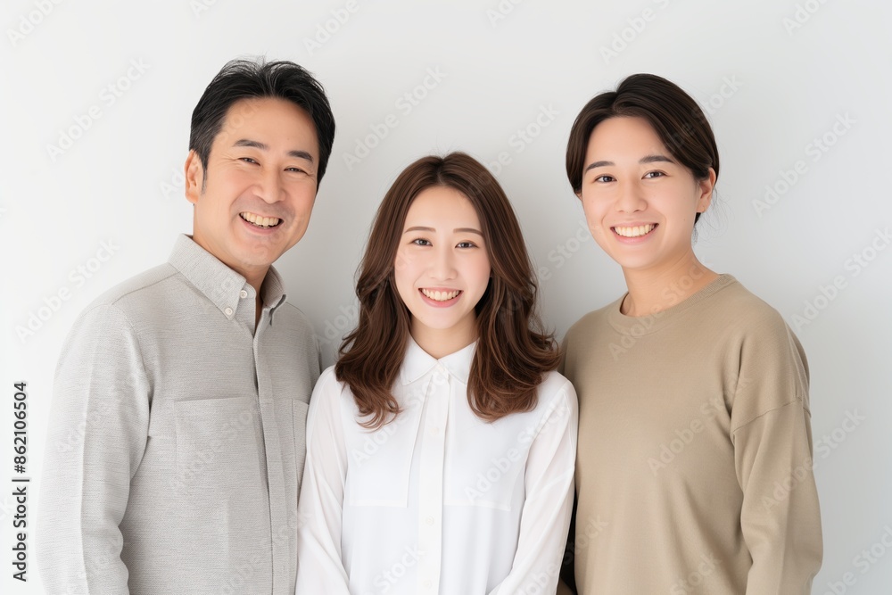Asian Family Portrait with Smiling Members. Generative AI. Asian Family Portrait with Smiling Members. Generative AI.