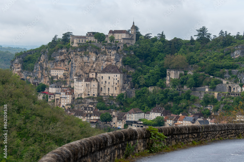 Rocamadour medieval village located on pilgrims route in Lot department in southwestern France, attracted visitors for its setting in gorge above tributary of River Dordogne, panoramic view Rocamadour medieval village located on pilgrims route in Lot department in southwestern France, attracted visitors for its setting in gorge above tributary of River Dordogne, panoramic view