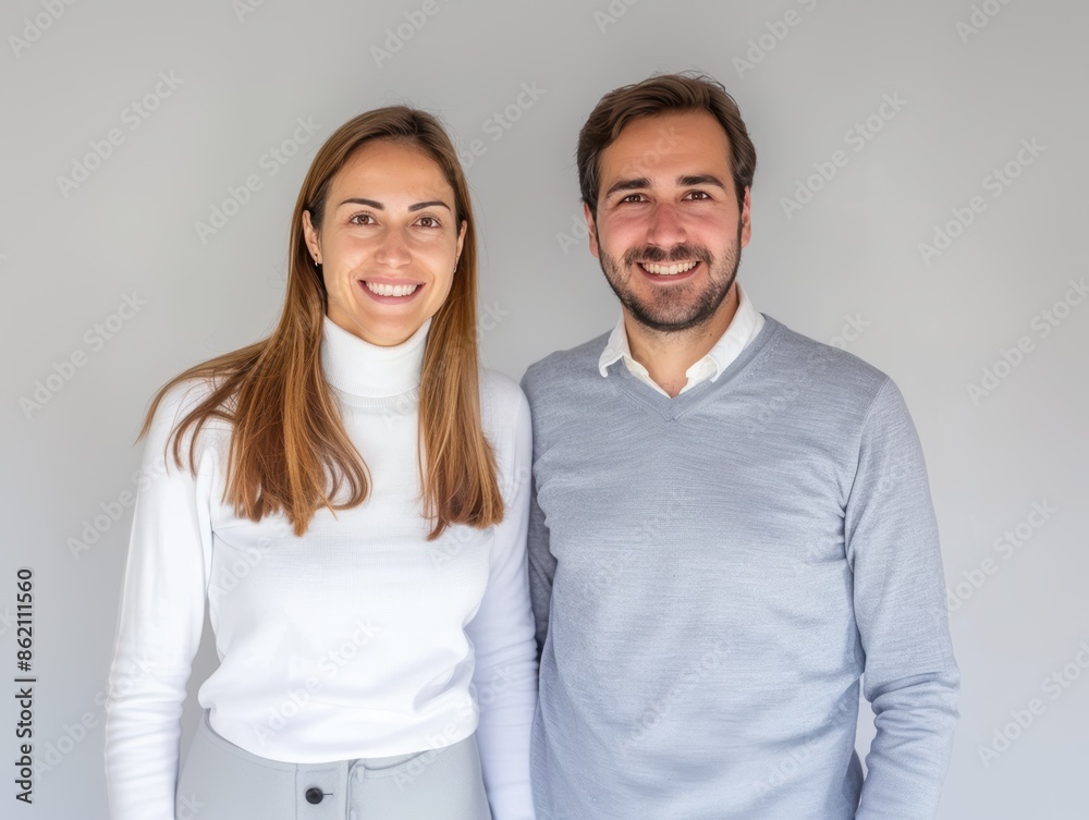 Professional Couple in Formal Attire Smiling. Generative AI. Professional Couple in Formal Attire Smiling. Generative AI.