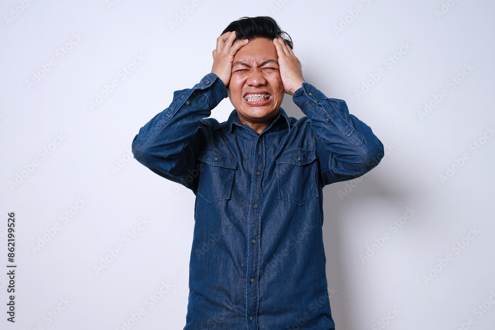 Asian Adult Guy Wear Braces Teeth Feeling Painful In Head Isolated On White Background Asian Adult Guy Wear Braces Teeth Feeling Painful In Head Isolated On White Background