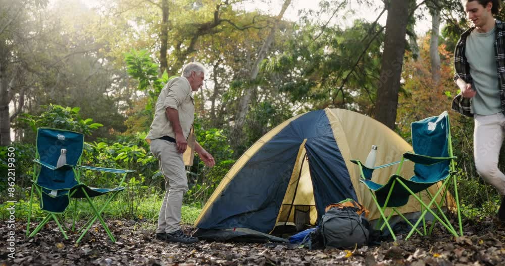Camping, father and son with tent, nature and conversation with vacation, countryside and recreation. People, family and dad with adult, trekking and forest for weekend break, getaway trip or holiday Camping, father and son with tent, nature and conversation with vacation, countryside and recreation. People, family and dad with adult, trekking and forest for weekend break, getaway trip or holiday