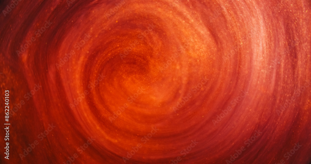 Glitter mist. Ink swirl. Defocused red orange golden color vapor cloud shiny particles texture paint floating in water abstract art background. Glitter mist. Ink swirl. Defocused red orange golden color vapor cloud shiny particles texture paint floating in water abstract art background.
