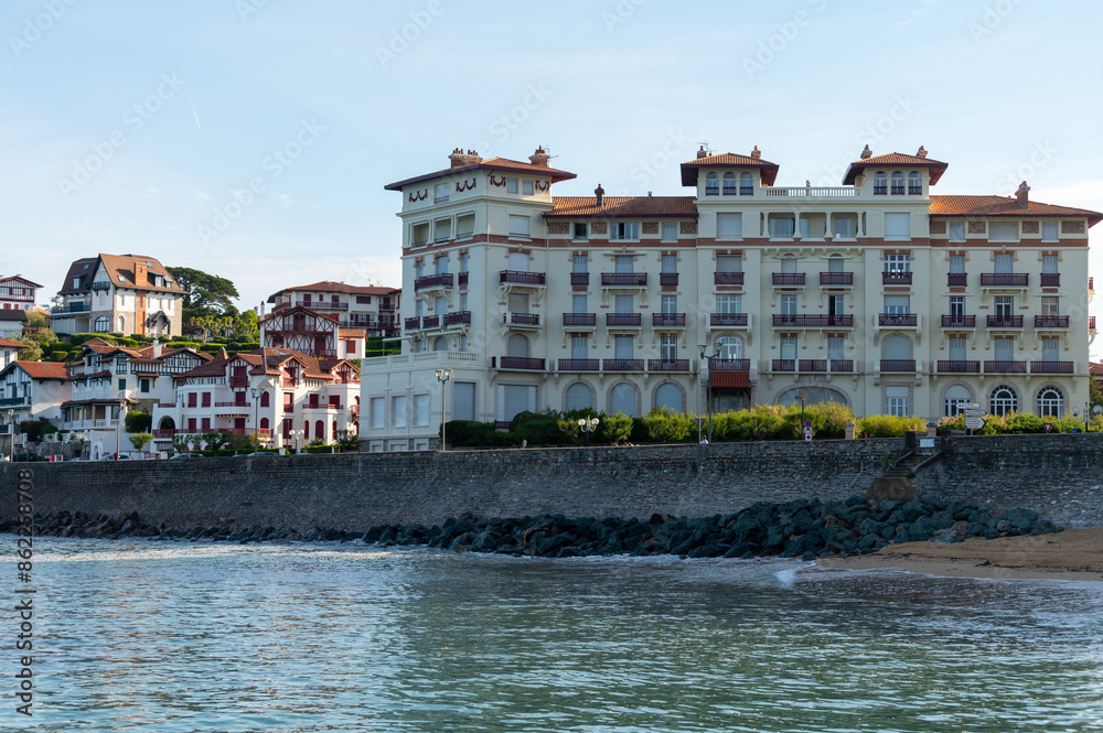 Obraz premium White houses and villas of Saint Jean de Luz on Basque coast, famous resort, known for beautiful architecture, nature and cuisine, South of France, Basque Country