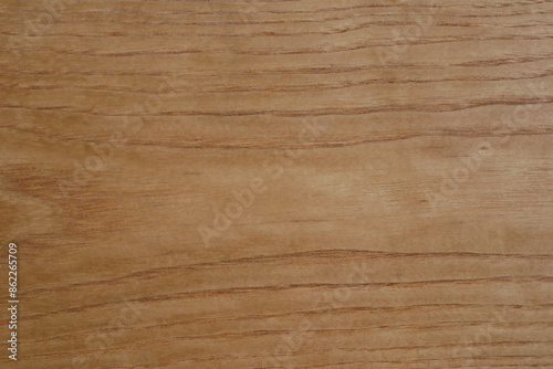 Elegant brown color of the wood surface. The natural rhythm of the wood grain background