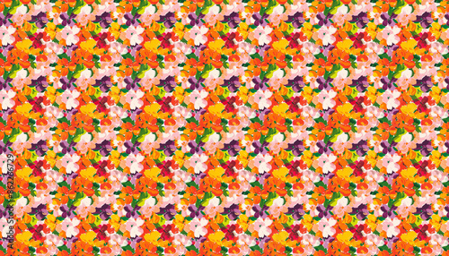 An abstract pattern of flowers with vibrant colors, featuring an oil painting