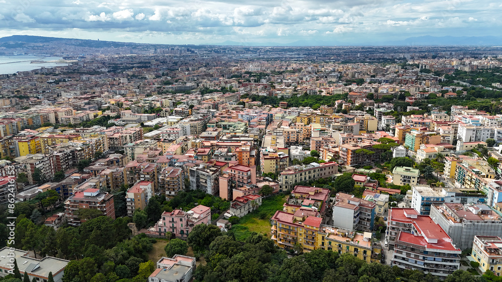 Aerial view of the metropolitan city of Naples. In the foreground the cities of Portici and San Giorgio a Cremano Aerial view of the metropolitan city of Naples. In the foreground the cities of Portici and San Giorgio a Cremano