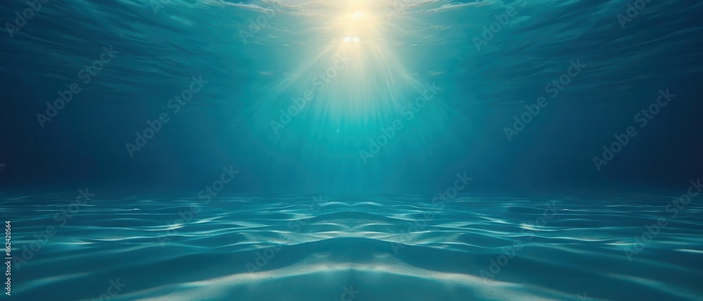 Sunlight piercing through the deep blue ocean, creating a serene and tranquil underwater scene with gentle waves. Sunlight piercing through the deep blue ocean, creating a serene and tranquil underwater scene with gentle waves.