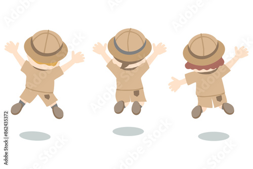 探検服を着てジャンプする子供たちの後ろ姿