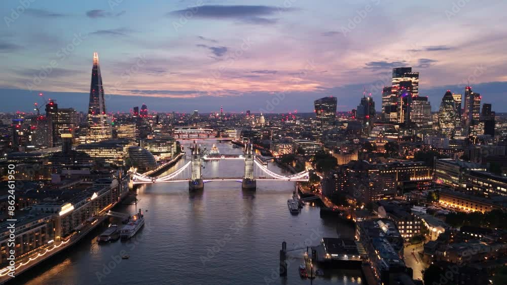London aerial cityscape twilight view with illuminated Tower Bridge over Thames