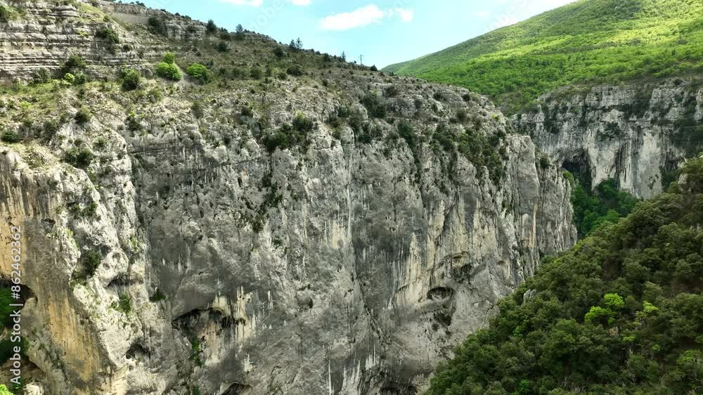 Steep Rock Climbing Wall of Verdon Gorge in the Provence AERIAL Steep Rock Climbing Wall of Verdon Gorge in the Provence AERIAL