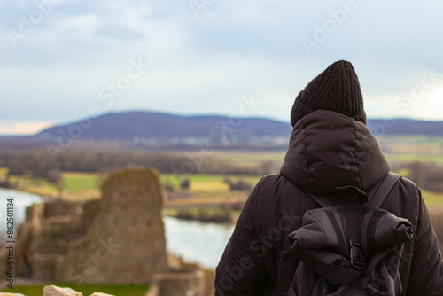 Photography Woman tourist in black outfit at the very top of Devin castle (Slovak: Devinsky hrad)