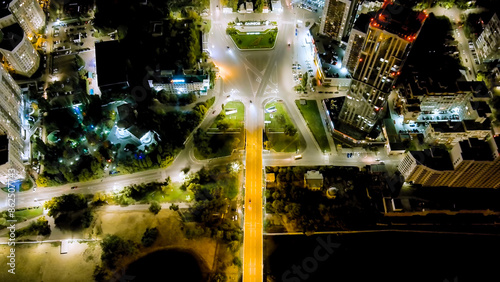 Saratov, Russia. Slavyanskaya Square. The text is translated as Saratov. Panorama of the night city, Aerial View photo