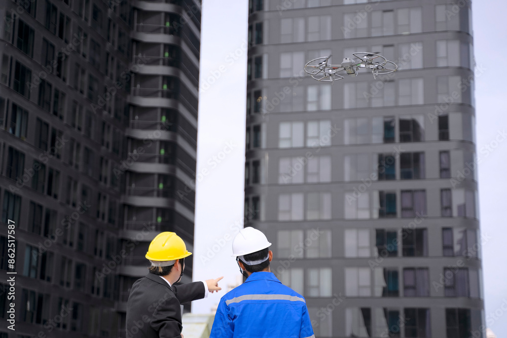 Engineers are checking cooling system at rooftop. Engineers are checking cooling system at rooftop.
