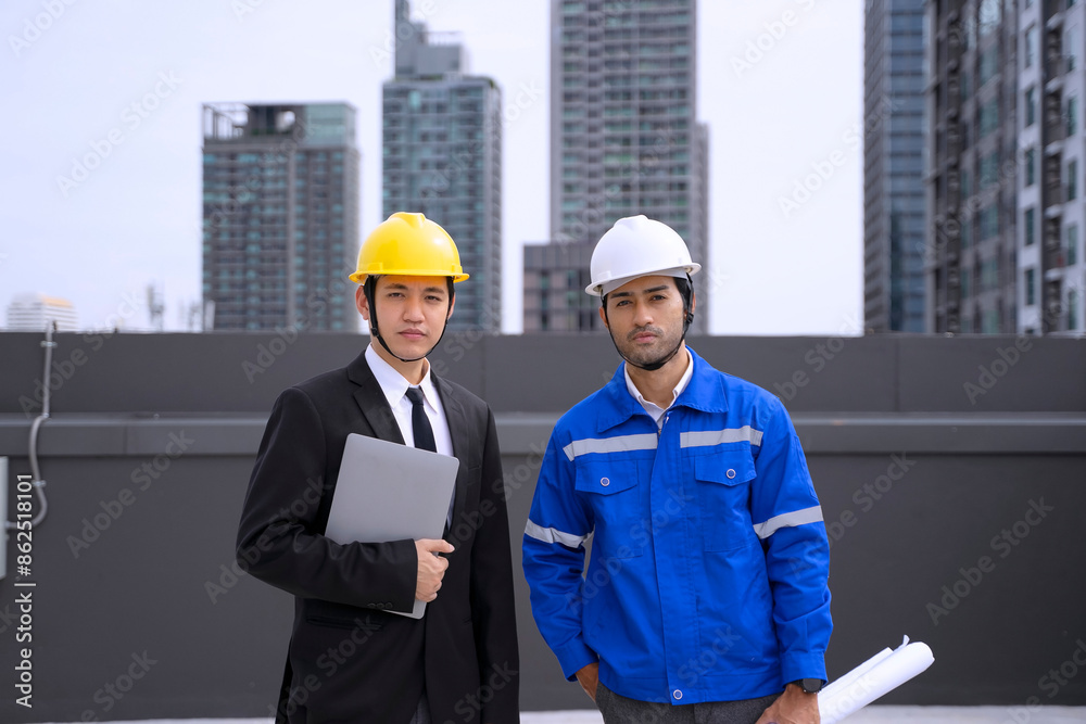 Engineers are checking cooling system at rooftop. Engineers are checking cooling system at rooftop.