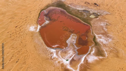 Aerial shot of the heart-shaped Wulan Lake in Tengger Desert in China photo