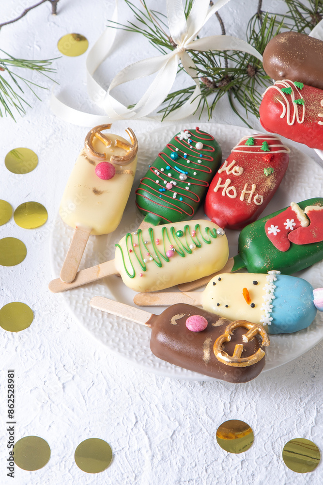 Christmas dessert. Sweet food. Cheesecake on a stick in the shape of ice cream. Children's treat in winter. Candy Christmas tree, snowman, deer and Santa Claus. Gingerbread cookies. Christmas dessert. Sweet food. Cheesecake on a stick in the shape of ice cream. Children's treat in winter. Candy Christmas tree, snowman, deer and Santa Claus. Gingerbread cookies.